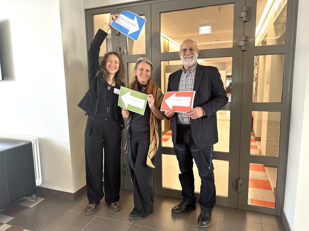 The English Language presentation team of Tamrika  Khvtisiashvili (Riga), Angela Dadak (Vilnius) and Stephen Schuit (Daugavpils).